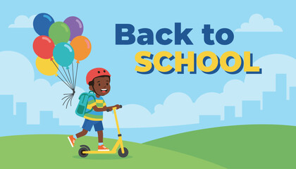 Fototapeta premium Cute schoolboy riding a yellow kick scooter with a backpack and colourful balloons on his back on a green hill.