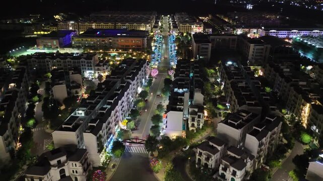Aerial nighttime view of modern Vinhomes quarter in Ho Chi Minh city or Saigon, Vietnam.