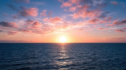 Fototapeta premium Vibrant sunset over the vast ocean with scattered pink clouds and shimmering reflection