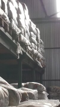 Shelves of cardboard boxes inside a storage food warehouse