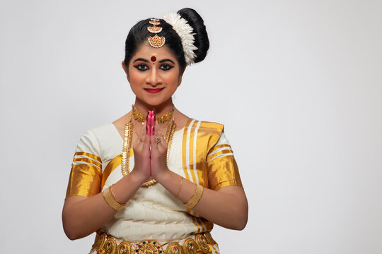Mohiniattam dancer greeting with her hands joined