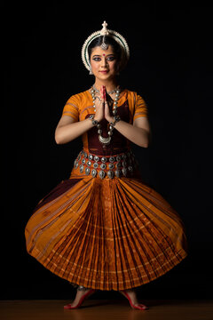 Odissi dancer performing Namaste pose