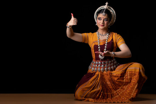 Odissi dancer performing praying mudra