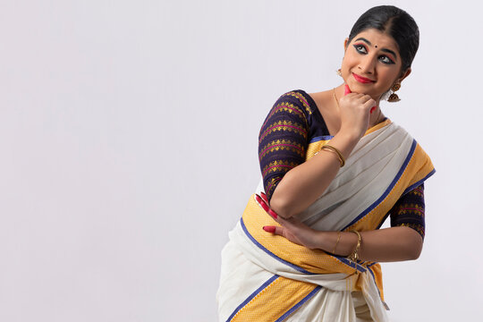 Indian classical dancer looking in amazement with Mushti mudra