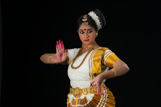Mohiniattam dancer representing the character of Goddess Durga with a Trishul in her hand