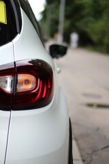 Fototapeta premium Rear of the car headlight close-up photo outdoor 