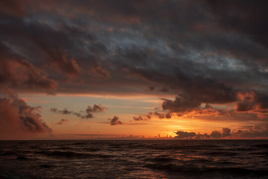 Dramatic stormy sky and sunset over the Baltic Sea, Lithuania