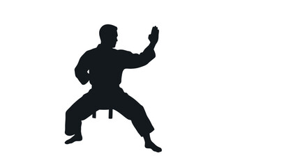 Obraz premium Karate student executes a focused hand strike while standing in a wide horse stance position.