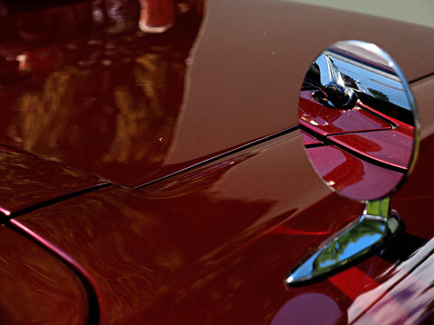 Red Vintage car sideview mirror