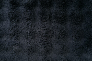 Dark plush black fur texture with smooth soft pattern and elegant premium look, ideal for Black Friday promotions, fashion marketing, cosmetic ads and luxury retail designs © svittlana