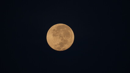 Stunning Full Moon Brightly Shining in Dark Night Sky © Jimmy