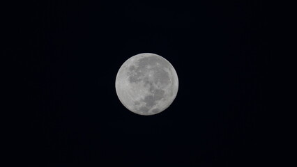 Bright Full Moon Glowing Against a Dark Cosmic Sky © Jimmy