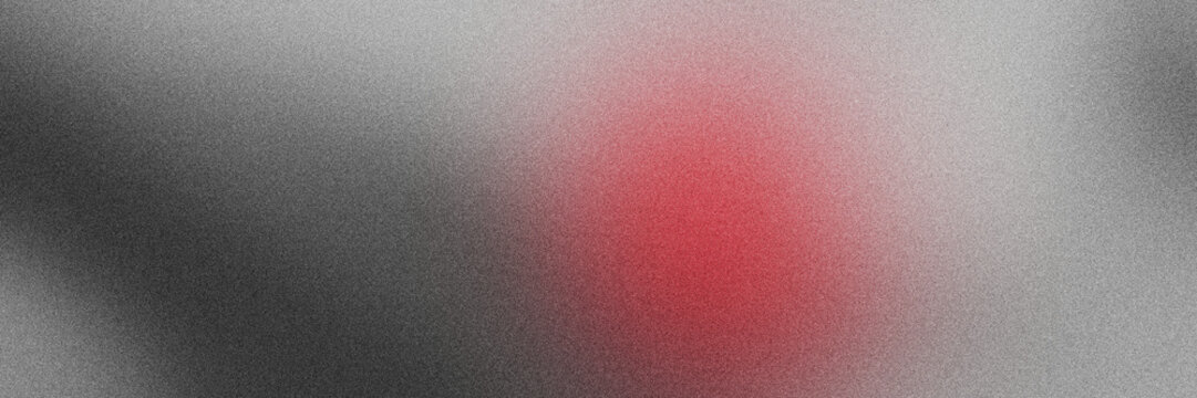 Abstract background, with a soft, grainy texture featuring, a glowing circular, light spot in, shades of deep, red against a, neutral gray backdrop