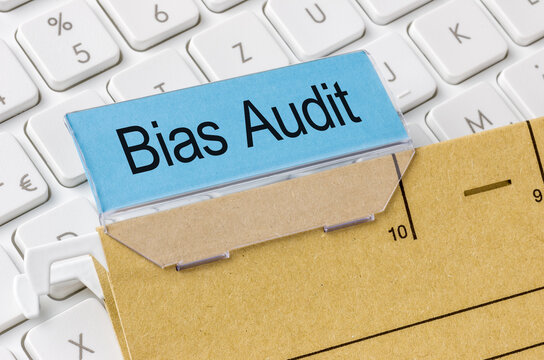 A brown file folder labeled with Bias Audit