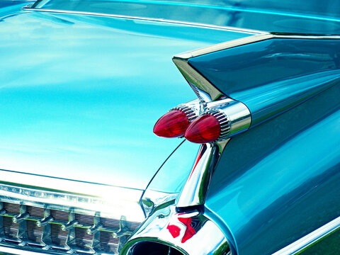 Big taillight close up shot of an American blue vintage car