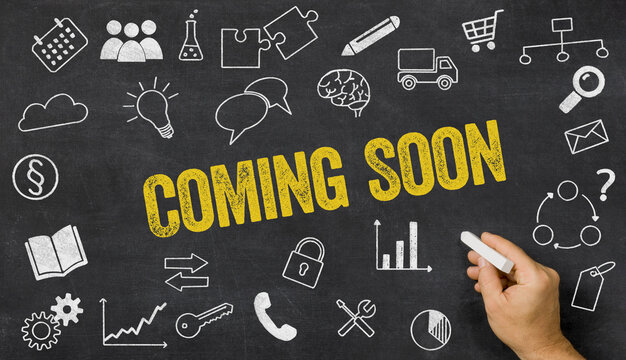 Coming Soon written on a blackboard with icons