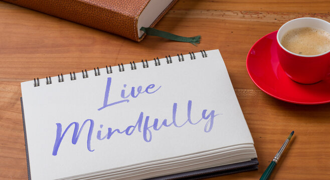 A Notepad on a desk - Live Mindfully