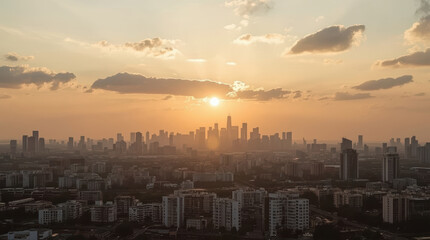 Fototapeta premium Sunset city skyline sunrise haze warm light urban skyline cityscape