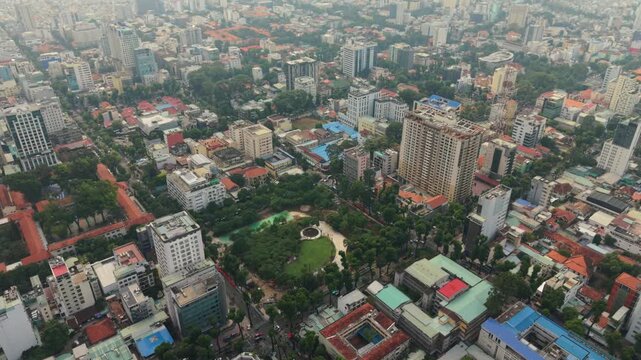 Vietnam, Ho Chi Minh Tree Lined Boulevard Ho Chi Minh Aerial Vista Showing Linear Perspective, Red Tiled Roofs, Shady Promenades, Mixed Lowrise Blocks And Distant Skyline