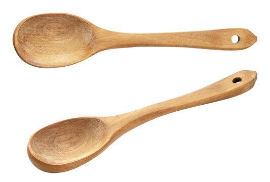 Set of wooden spoons close-up on a white. Isolated