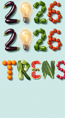 Naklejka premium Numbers 2023 and word TRENS made of fruits and vegetables, showcasing healthy eating trends and concepts for the new year.