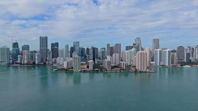 Miami Brickell skyline with skyscrapers and bay. Miami aerial cityscape with skyline. Miami coastal skyline with shoreline. Miami downtown skyline with towers.