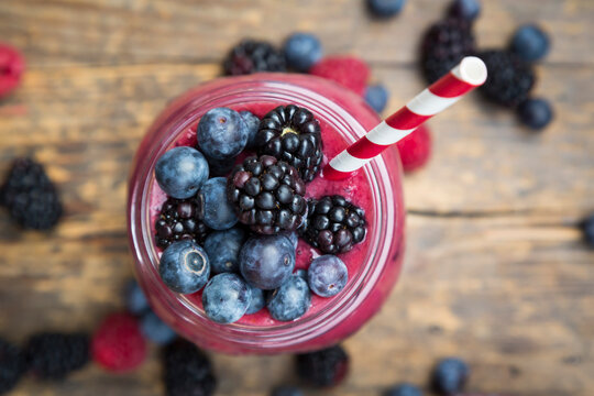 Glass of blueberry blackberry smoothie