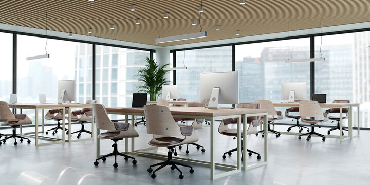 The modern open office displays an empty workspace