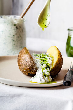 Baked potato with herb quark and homemade ramson oil