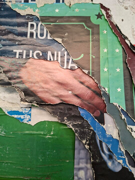 Torn and ripped urban textured paper poster grungy background