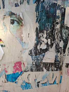 Torn and ripped urban textured paper poster grungy background