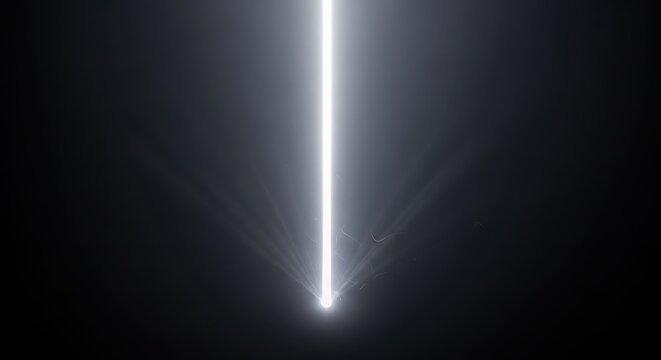 A powerful, concentrated shaft of white light piercing through a dark, foggy environment. Dramatic illumination and visual contrast, spotlight, mystical, visual