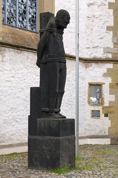 Osnabruck, Germany. The Bound Man sculpture, a memorial to the victims of truth and freedom. The sculpture by sculptor Gerhard Marcks was unveiled on July 20, 1964 in front of the Dominican Church.