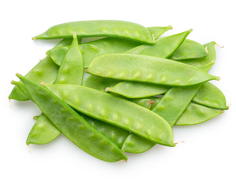 A loose pile of fresh, young green snow peas in pods, isolated on a white background.