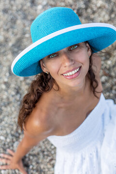 Woman relaxing at the seaside.