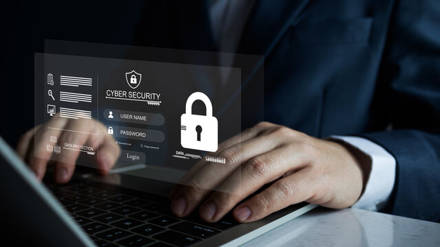 Businessman using laptop login username and password on virtual screen. Cyber security protect business transaction from online, privacy smart security software protection digital financial data.