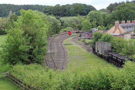 Train line running past an old pit village