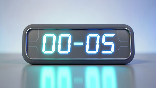 clock 00:05 displayed on a modern digital LED alarm clock with glowing blue numbers on a reflective surface.