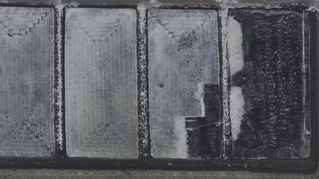 erial drone footage of Long Dien Salt Fields in Ho Chi Minh City, Vietnam, featuring traditional sea salt production, geometric salt ponds, coastal landscape and sustainable local industry.