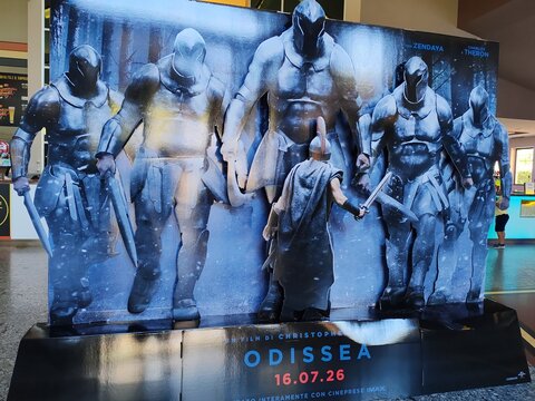 Ostia, Rome, Italy - July 22, 2026, advertising panel for director Christopher Nolan's film Odyssey, shot entirely with an IMAX camera, at Cineland Multiplex, Ostia's main multiplex cinema.