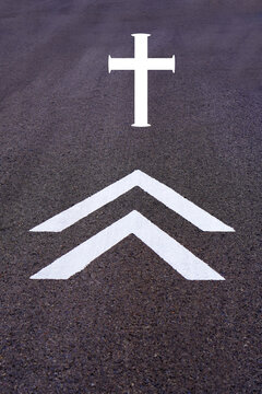Religion, resurgence of Christianity, faith. upward pointing arrows directed toward a Latin cross.
