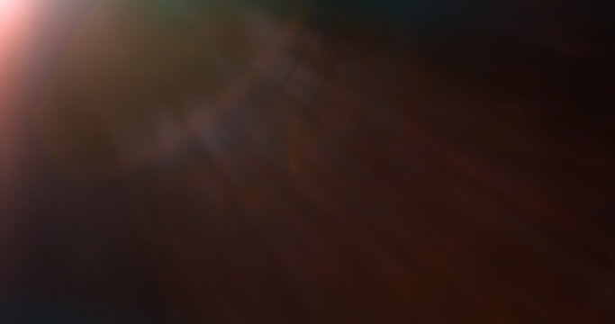 Abstract cinematic lens flare overlay with soft blue light rays, subtle optical glow and dark background. Premium VFX element for compositing, film editing, titles and motion graphics.