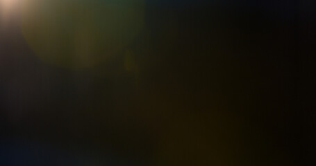 Plakat Abstract cinematic lens flare overlay with soft blue light rays, subtle optical glow and dark background. Premium VFX element for compositing, film editing, titles and motion graphics.