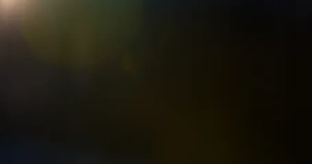 Abstract cinematic lens flare overlay with soft blue light rays, subtle optical glow and dark background. Premium VFX element for compositing, film editing, titles and motion graphics. © Jag_cz