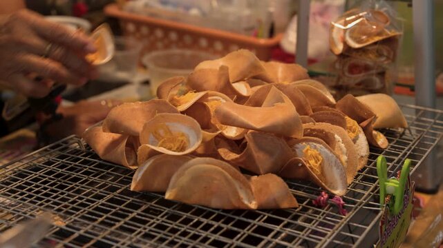Thai Crispy Crepes Khanom Buang at a Night Market in Thailand