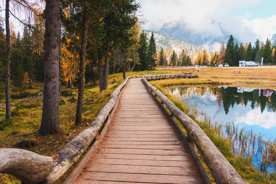 Lake Antorno with Autumn Forest and Dolomites Mountain Reflection in Italy