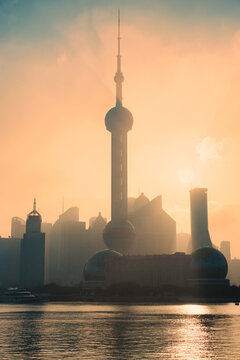 Shanghai Skyline at Golden Sunrise with Oriental Pearl Tower and Modern Skyscrapers in China