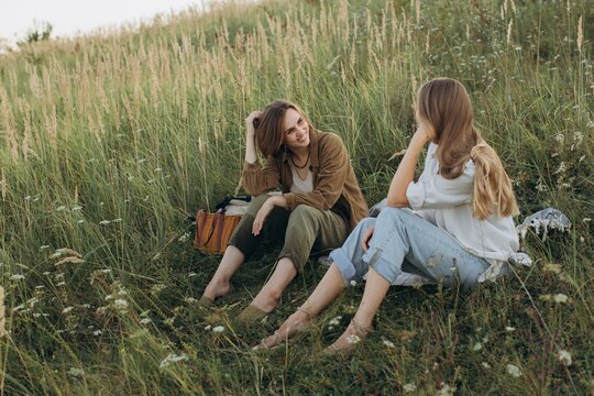 Women friends enjoying conversation in nature