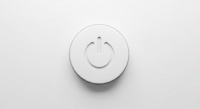 white power button on round object