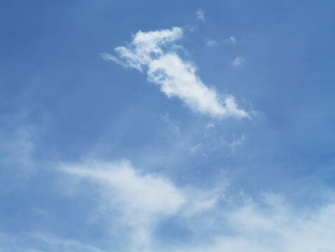 Sky and fluffy clouds background for peace and tranquility